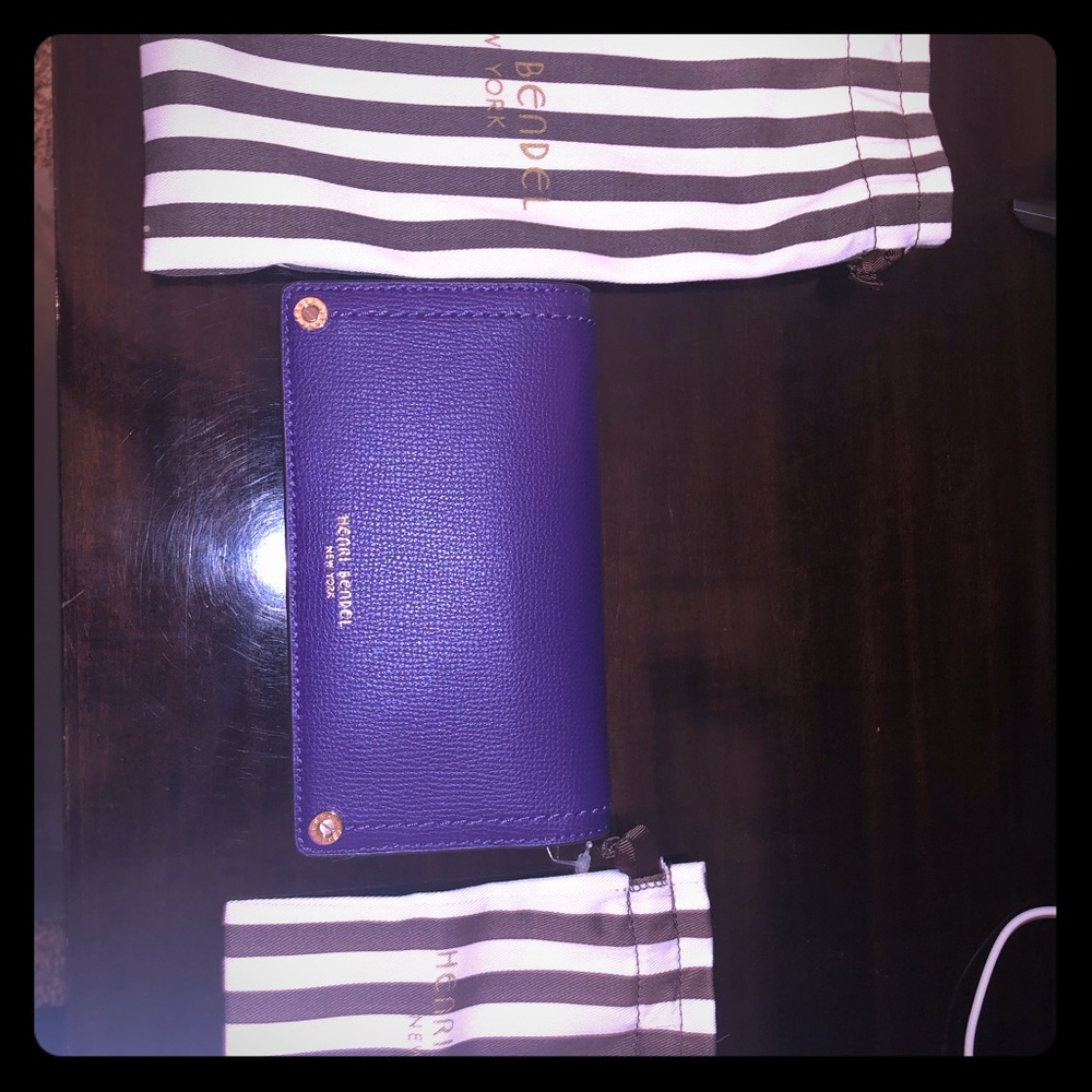 Purple clutch with strap purse/wallet